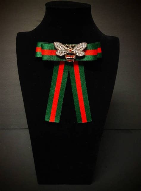 gucci bow tie brooch|gucci pins and brooch.